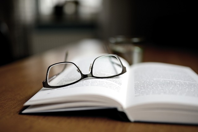 Opened Book with Glasses