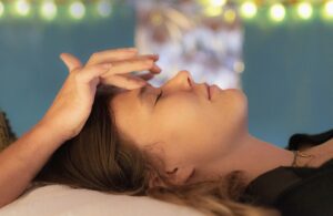 Woman undergoing Reiki Treatment