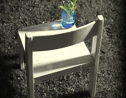 Empty Chair with Flower