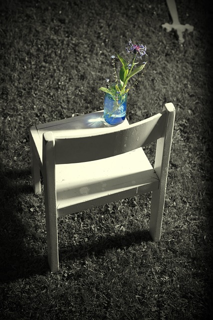 Empty Chair with Flower