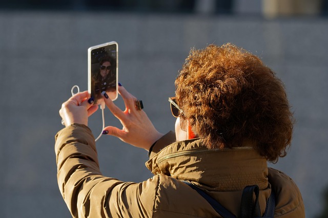 Mature Woman taking selfie